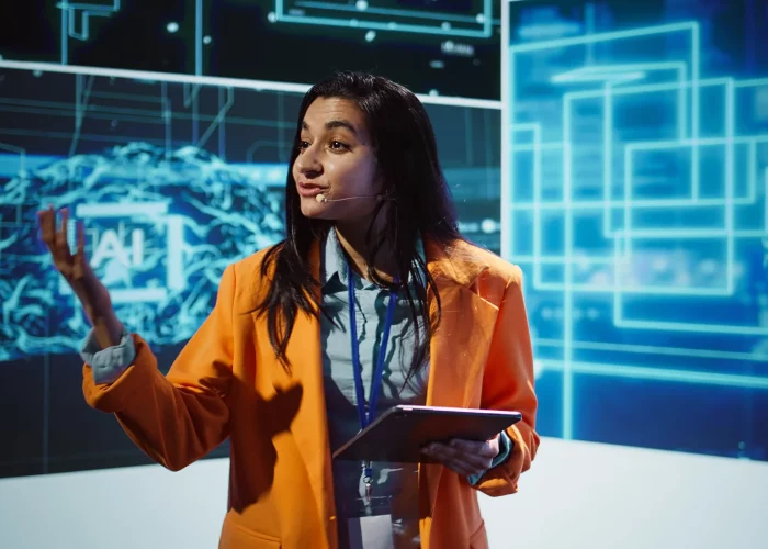 public-speaker-doing-presentation-tech-forum-event.opti