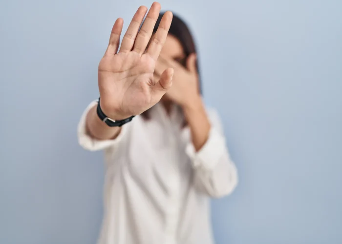 young-hispanic-woman-standing-white-background-covering-eyes-with-hands-doing-stop-gesture-with-sad-fear-expression-embarrassed-negative-concept.opti